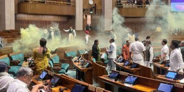 Chaos in parliament: Intruders armed with smoke canisters disrupt proceedings