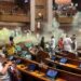 Chaos in parliament: Intruders armed with smoke canisters disrupt proceedings