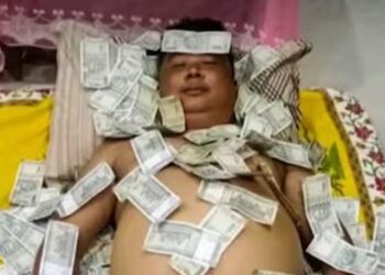 Image of UPPL member sleeping on bed of cash stirs row in Assam; BPF alleges extortion