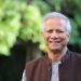 Why does Prof Yunus demand a mid-term election in Bangladesh?