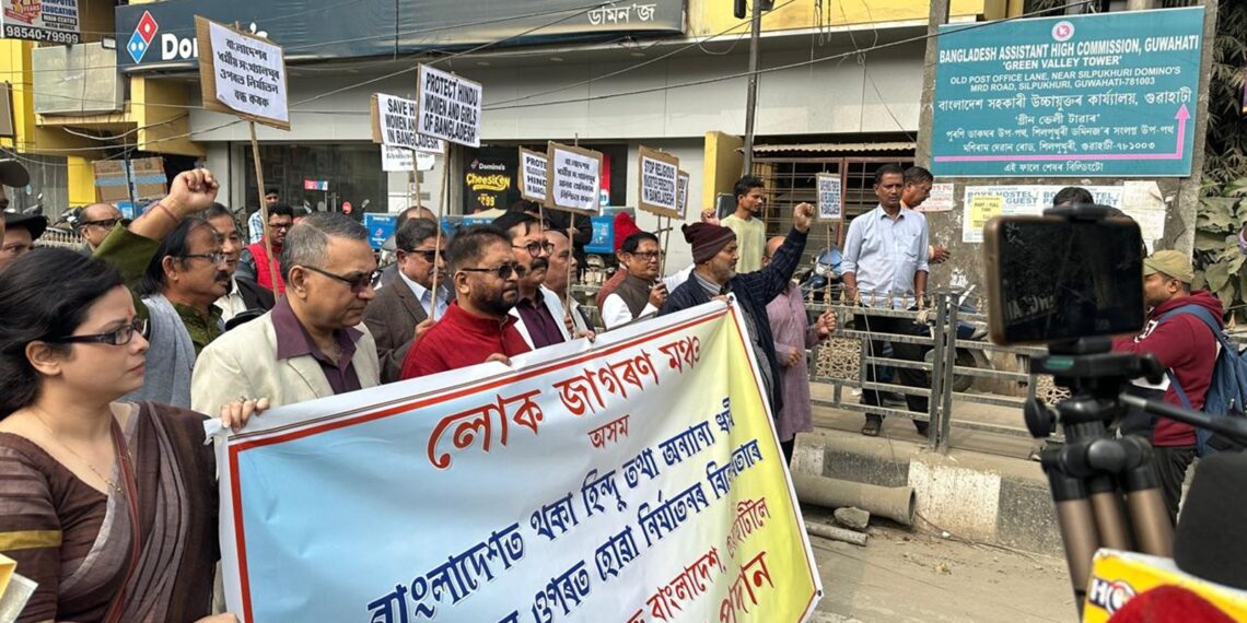 People of Assam hold a protest rally in Guwahati on Tuesday