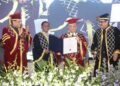 Assam Governor Lakshman Prasad Acharya along with MP Ranjan Gogoi and other dignitaries at the 4th Convocation of Royal Global University