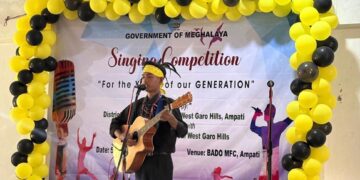 A participant performs in a singing competition held at Ampati, South West Garo Hills