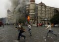 A file photo of Taj Hotel during the 2008 terror attack in Mumbai (SumitHansd/X)