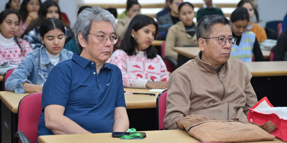 Eminent poet and NEHU teacher Robin Ngangom (right) during a session at Dibrugarh University International Literary Festival on Thursday