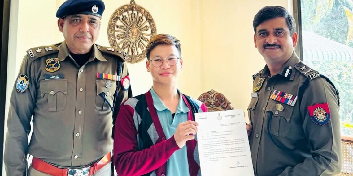 P Mario Pathaw receives the appreciation letter from the Assam Police