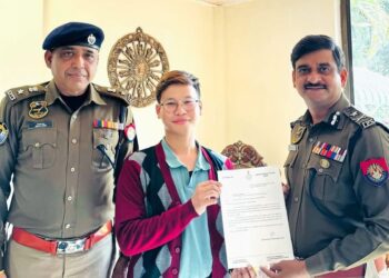 P Mario Pathaw receives the appreciation letter from the Assam Police