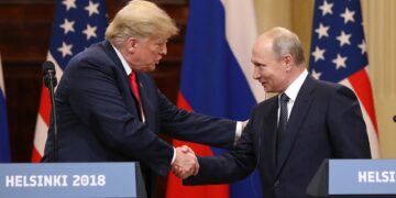 A file photo of Donald Trump and Vladimir Putin shaking hands (BRICSinfo/X)