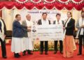 Chief Minister Conrad K. Sangma hands over a financial grant of Rs. 1 crore to Nazareth Hospital