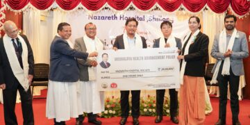 Chief Minister Conrad K. Sangma hands over a financial grant of Rs. 1 crore to Nazareth Hospital
