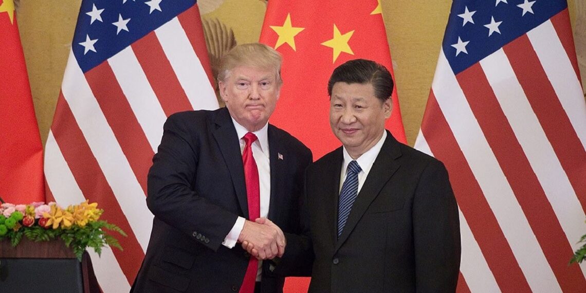 A file photo of US President Donald Trump and Chinese President Xi Jinping (X)