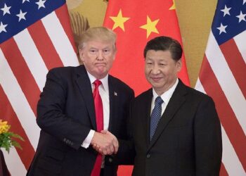 A file photo of US President Donald Trump and Chinese President Xi Jinping (X)