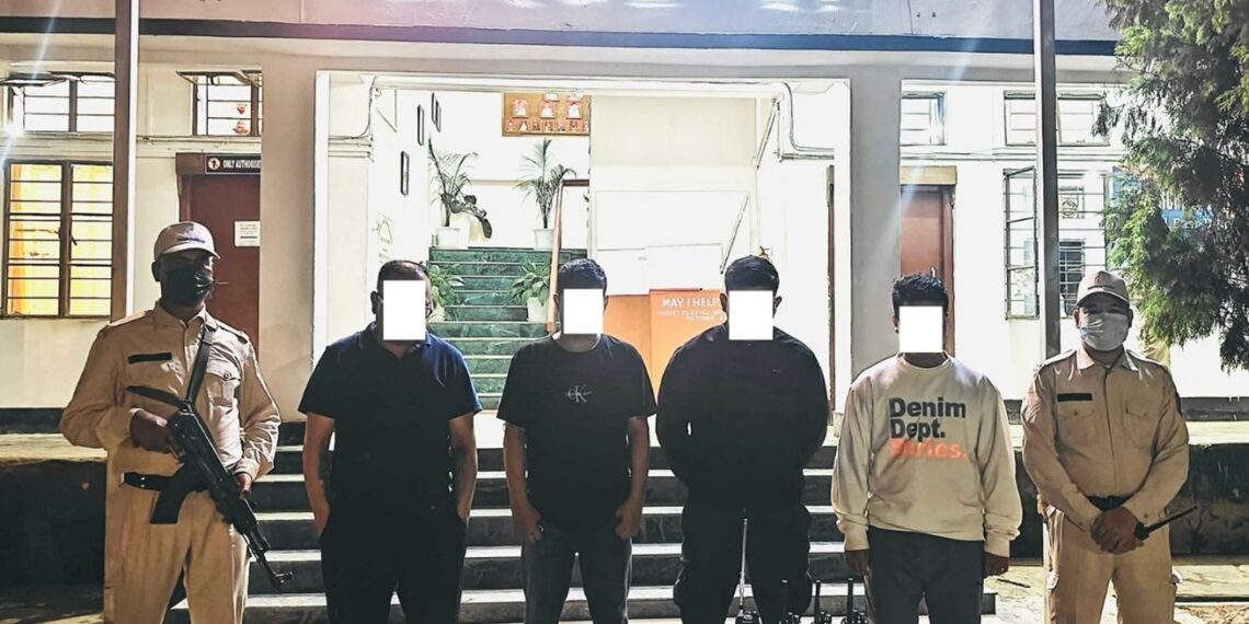 A file photo of arrested UNLF-P insurgents along with the seized weapons in Manipur (X)