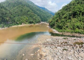 Pristine Umngot River choked by debris from Shillong–Tamabil highway work