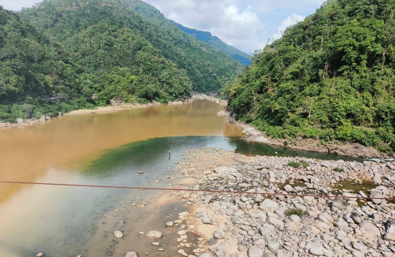 Pristine Umngot River choked by debris from Shillong–Tamabil highway work