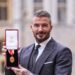 Sir David Beckham: Football icon receives knighthood from King at Windsor Castle