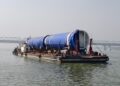 Morigaon-bound over dimensional cargo reaches Guwahati’s Pandu via inland waterways